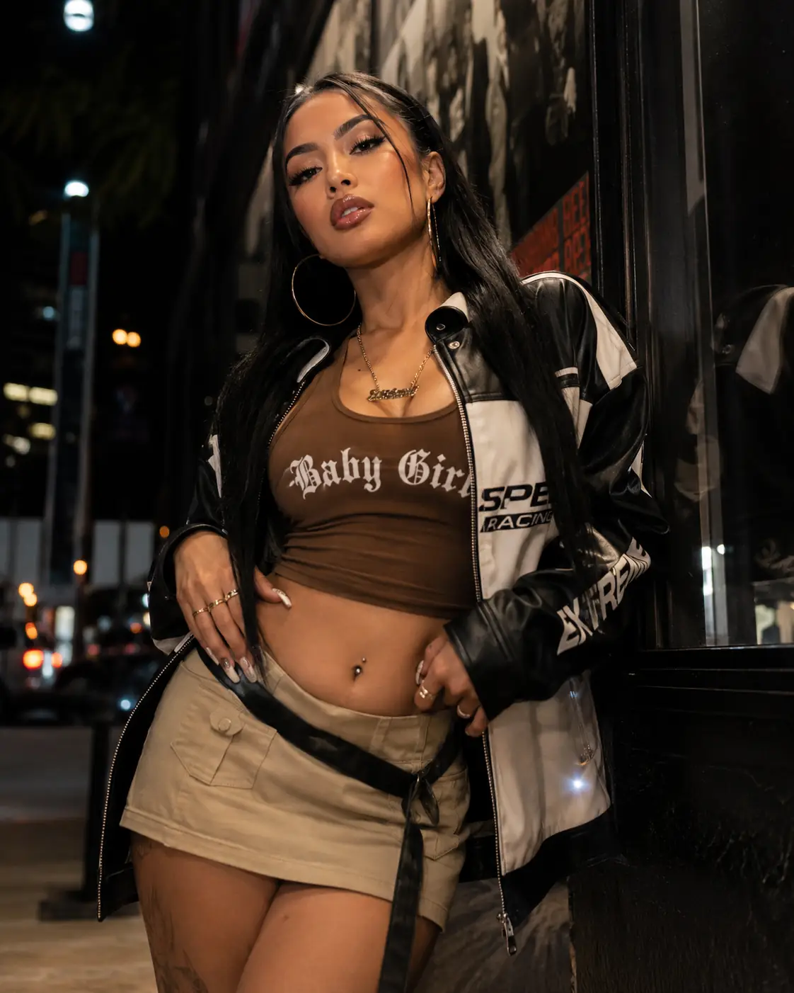 Anna in a night-time streetwear look